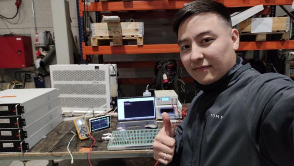 A technician working at an ASIC repair center