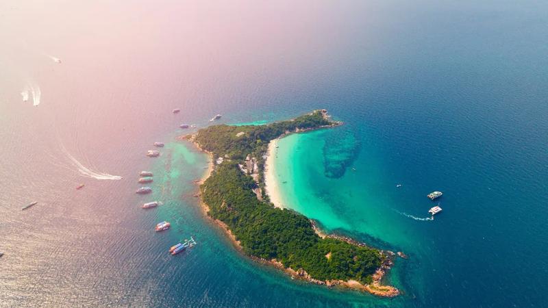 Aerial view of Koh Larn's turquoise bays off the Pattaya coast