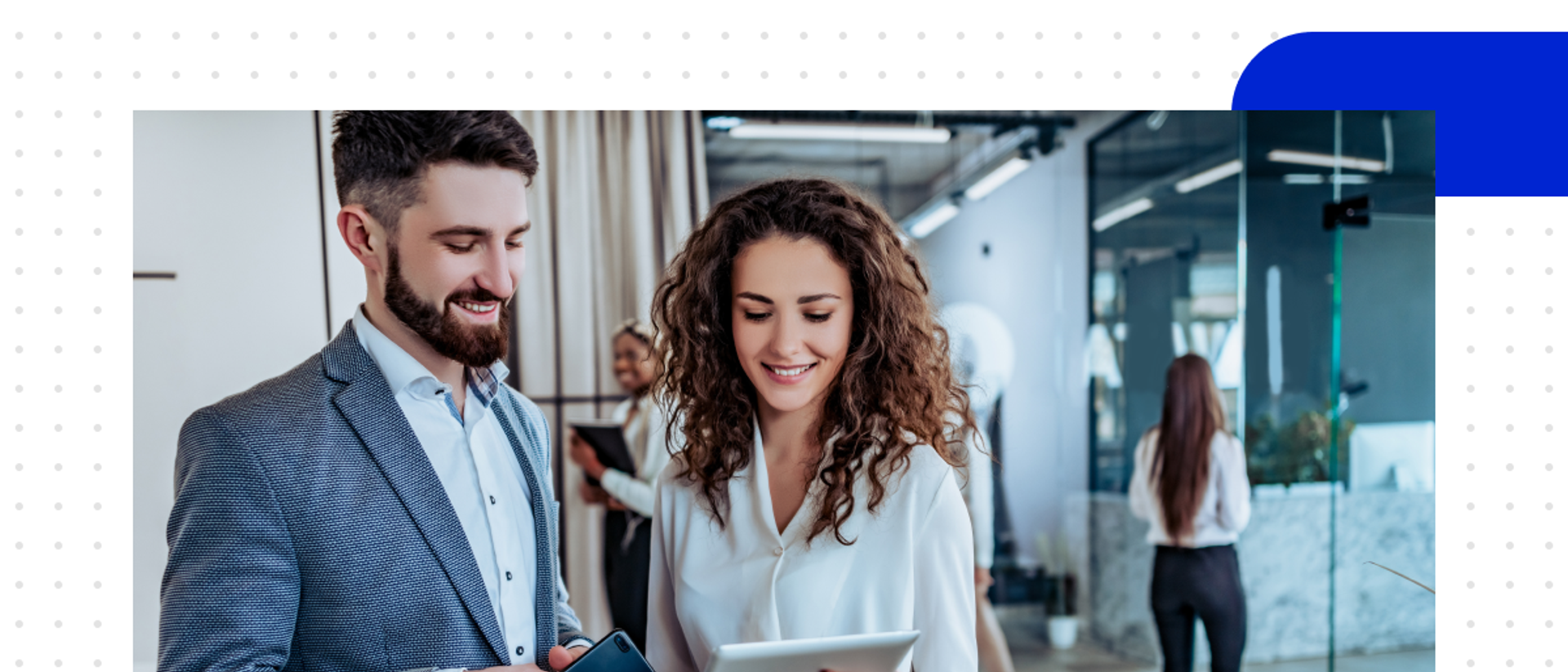 A woman and a man are using Salesforce Marketing Cloud Next on a tablet.