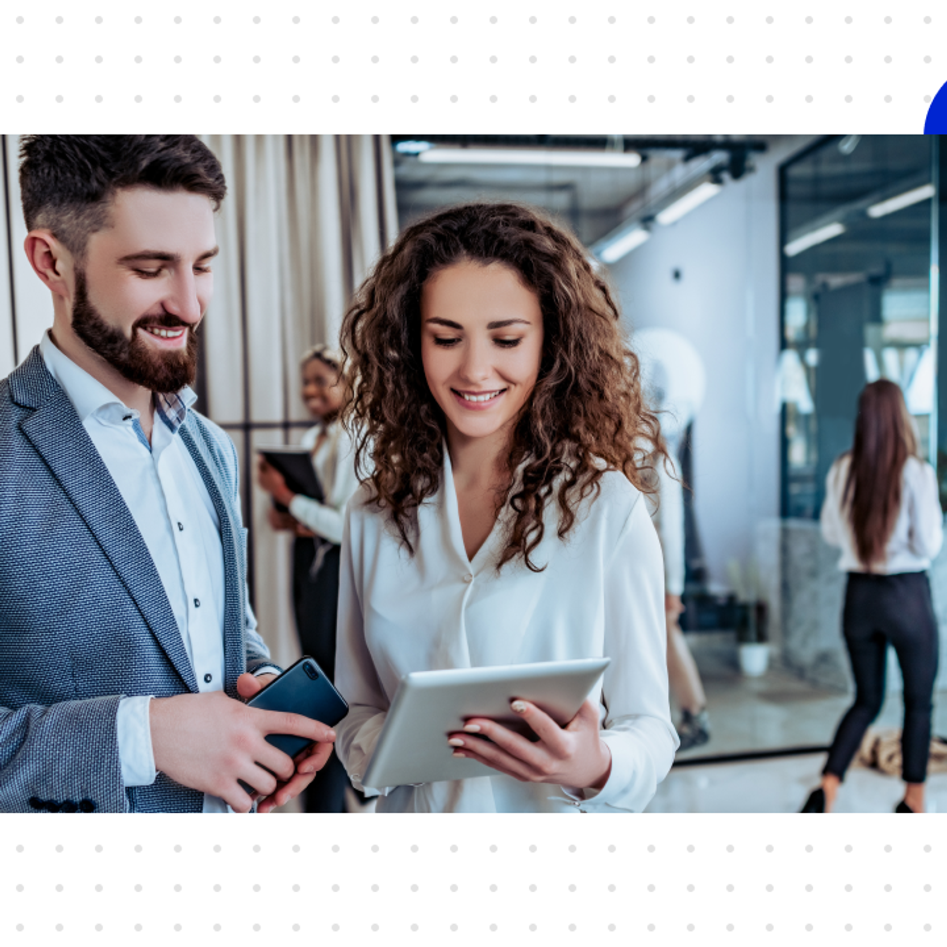 A woman and a man are using Salesforce Marketing Cloud Next on a tablet.