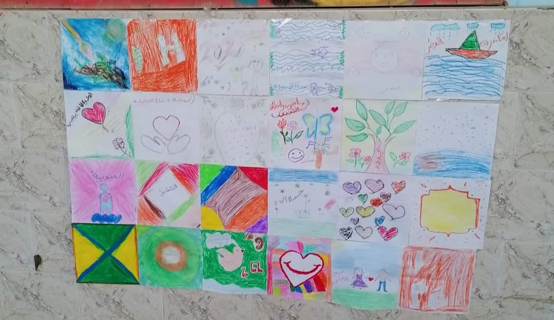 A grid of colorful children's drawings featuring hearts, nature scenes, and abstract designs.