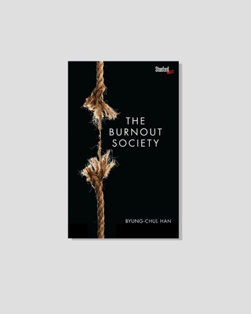 Book cover for "The Burnout Society" by Byung-Chul Han, featuring a thick rope frayed and nearly broken in the middle on a black background.