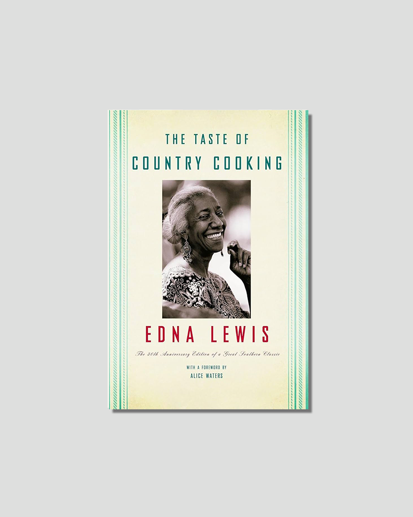 Book cover for "The Taste of Country Cooking" by Edna Lewis, featuring a smiling portrait of the author.