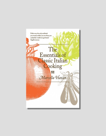 The Essentials of Classic Italian Cooking cookbook cover by Marcella Hazan, featuring illustrations of an orange tomato, a green artichoke, and brown eggplants.