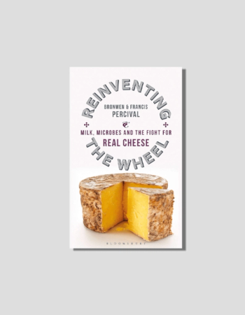 Book cover for "Reinventing the Wheel: Milk, Microbes and the Fight for Real Cheese" by Bronwen & Francis Percival, showing a wheel of yellow cheese with a slice removed.