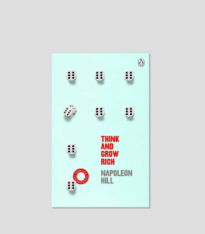 Book cover for "Think and Grow Rich" by Napoleon Hill, featuring white dice on a light blue background.