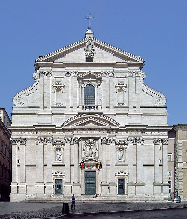 Ornate white Baroque church facade.