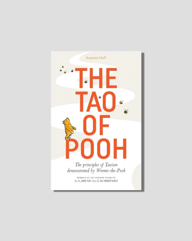 "The Tao of Pooh" book cover by Benjamin Hoff, featuring Winnie-the-Pooh looking up at bees.