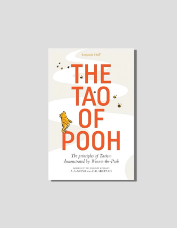 "The Tao of Pooh" book cover by Benjamin Hoff, featuring Winnie-the-Pooh looking up at bees.