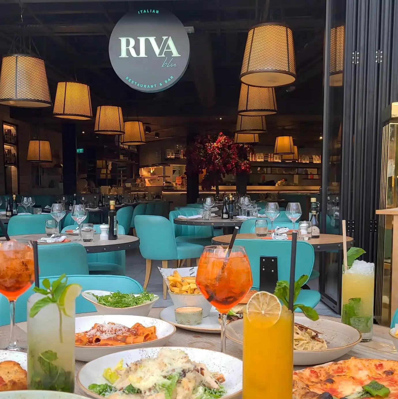 Riva Blu Interior with logo signage