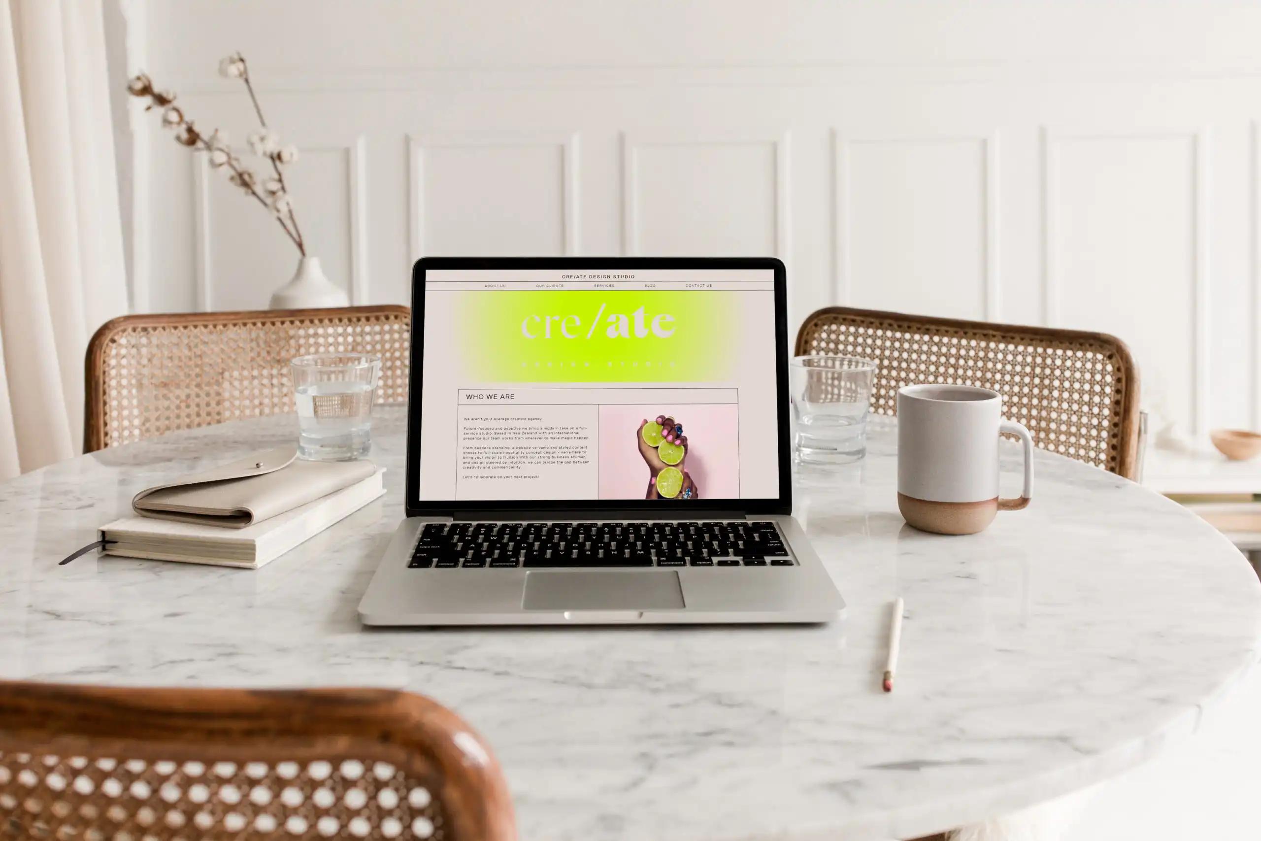 Cre/ate website on a laptop