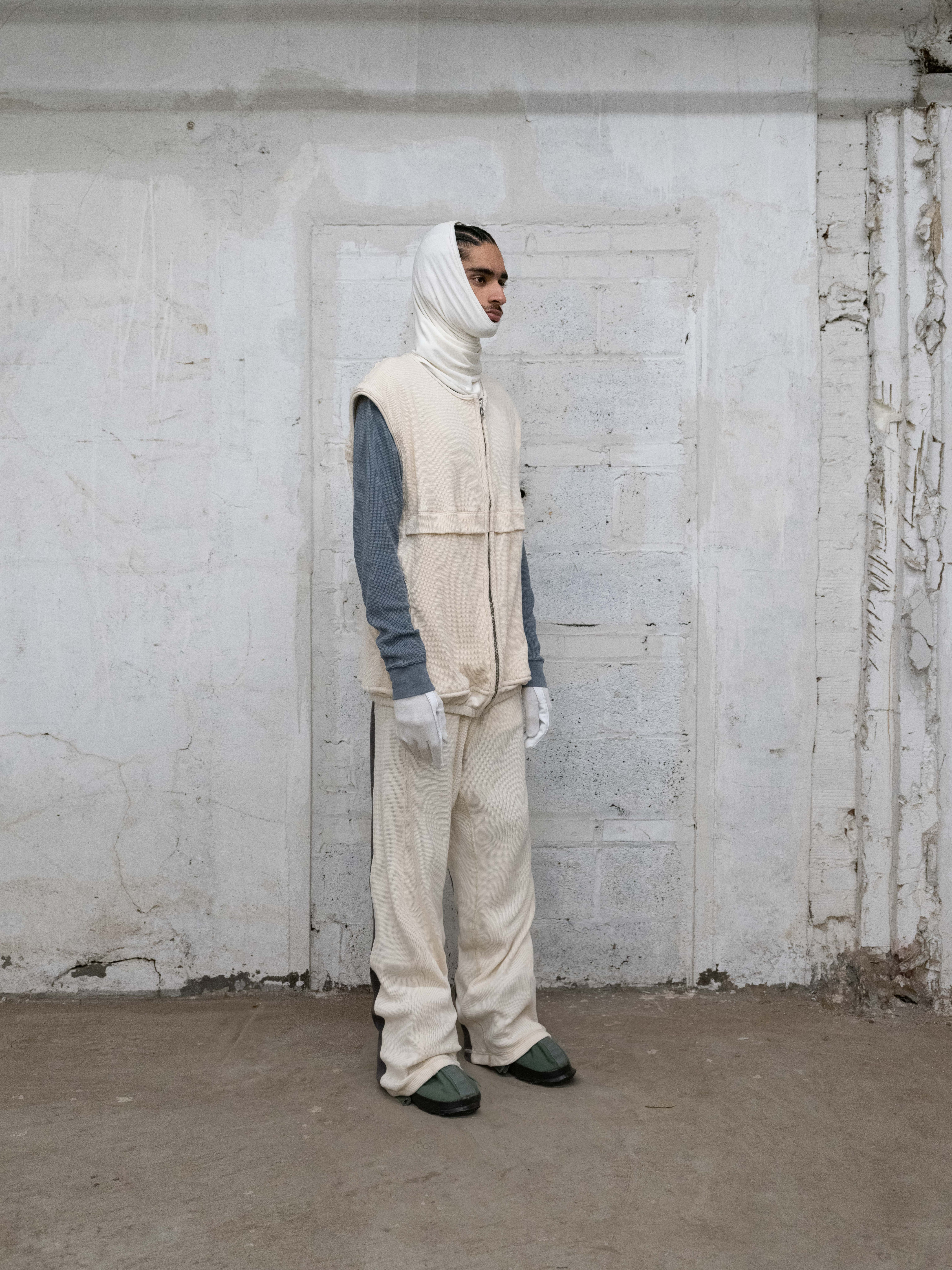 man wearing ventilation vest, LCV thermals and headscarf v2 from bryan jimenez fall/winter 2022