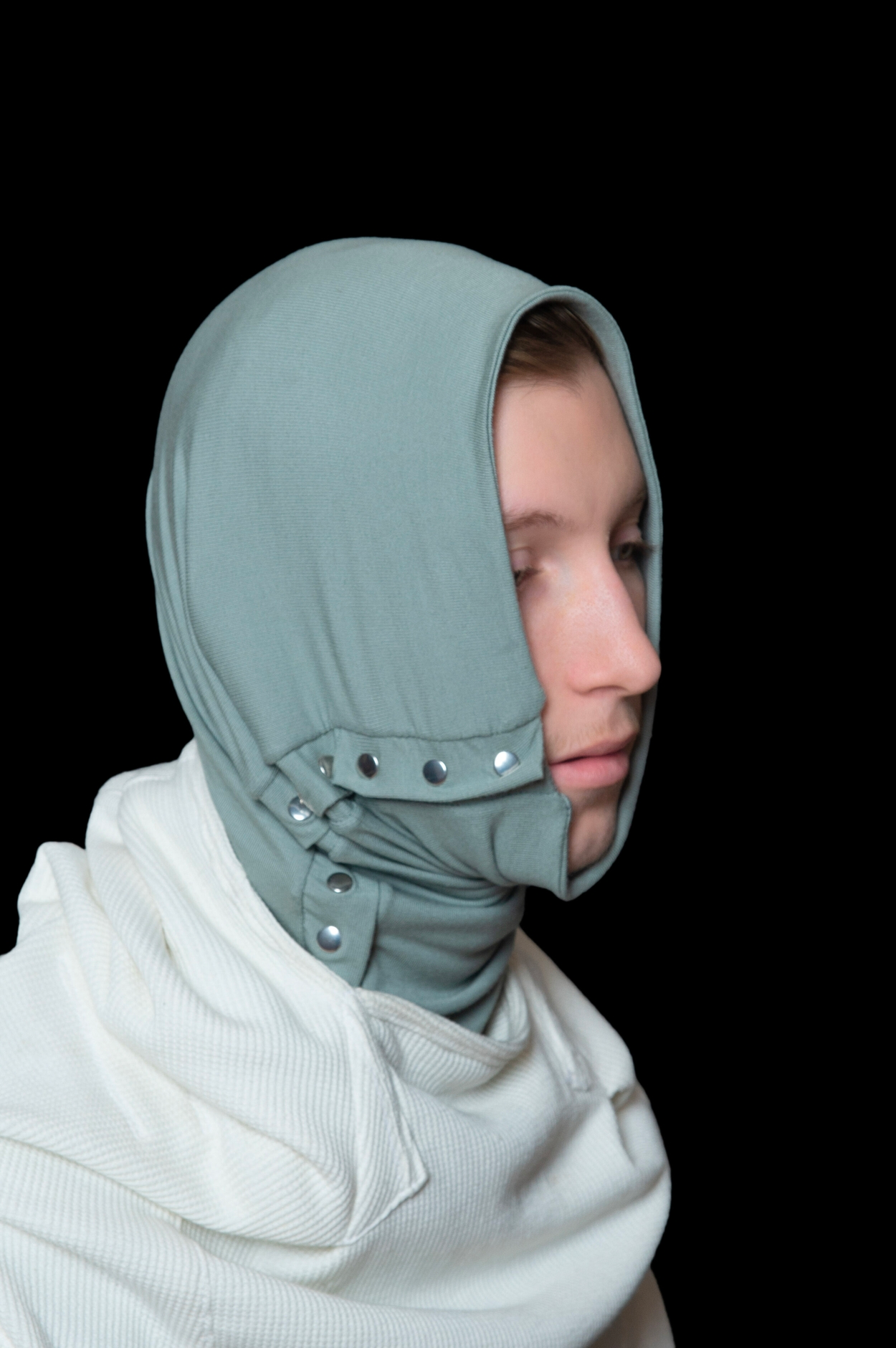 headshot of man wearing headscarf and polaris hooded thermal from bryan jimenez fall winter 2020