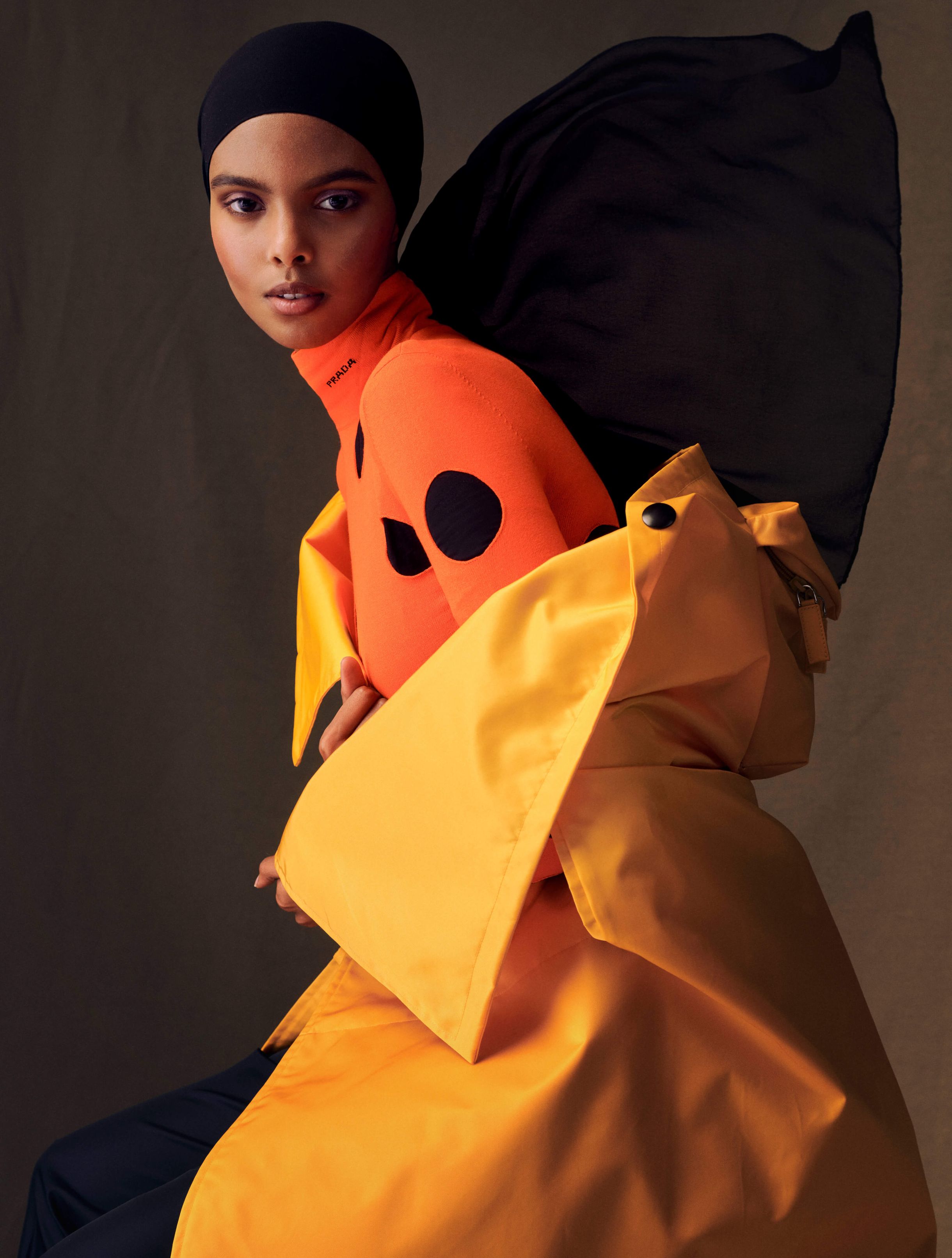 An image of [model name] for the cover of Harper's Bazaar wearing Prada