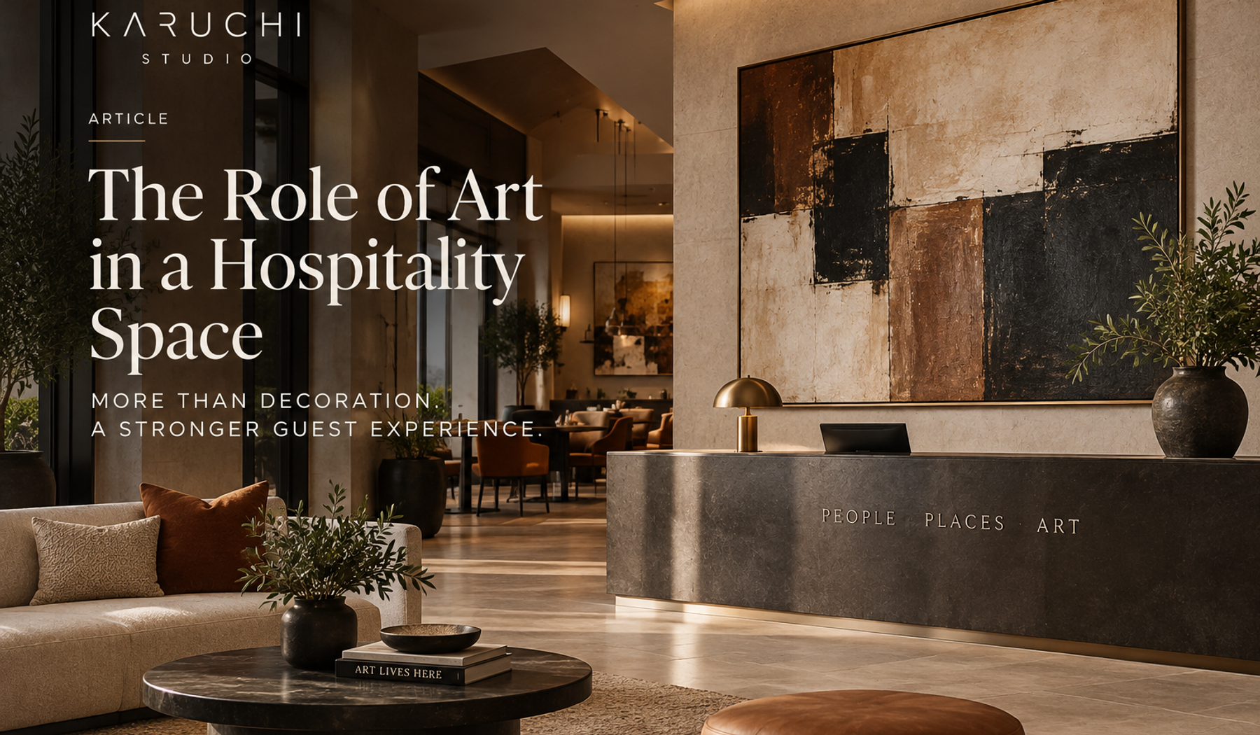A hotel reception area with art behind the reception desk