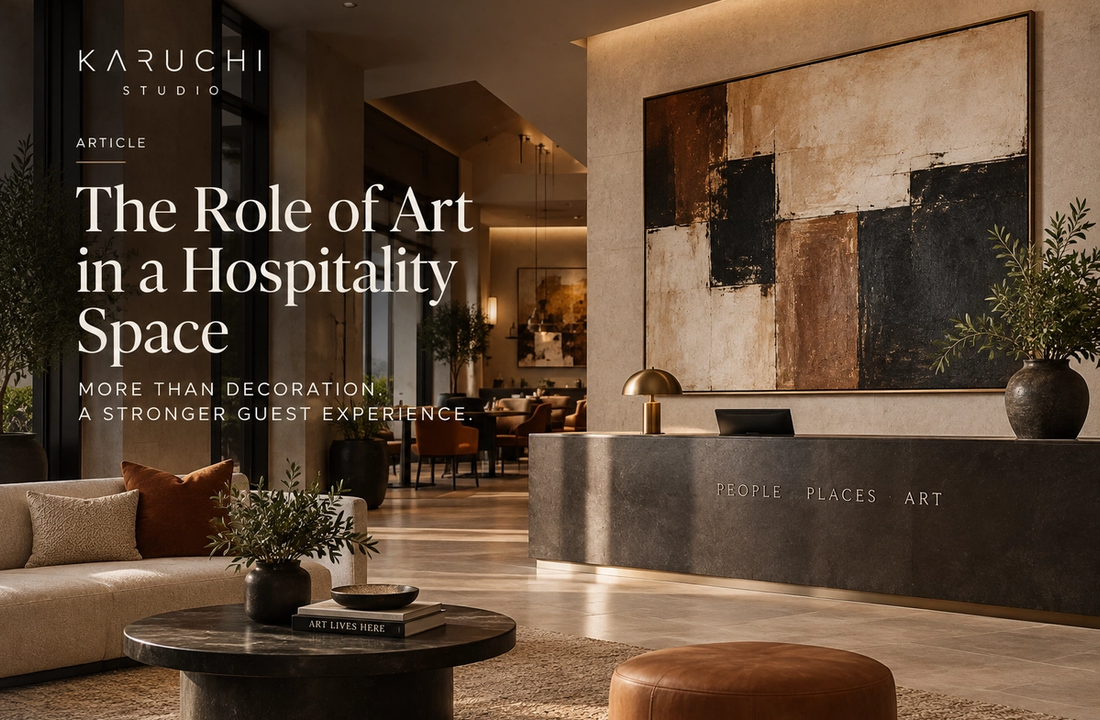 A hotel reception area with art behind the reception desk