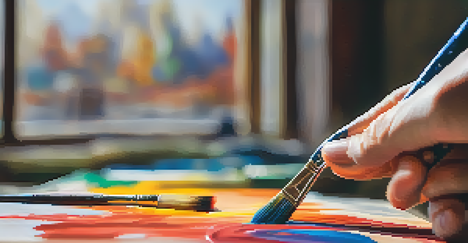 A close-up of a hand with a paintbrush dipping into colorful paint, highlighting the artistic process.