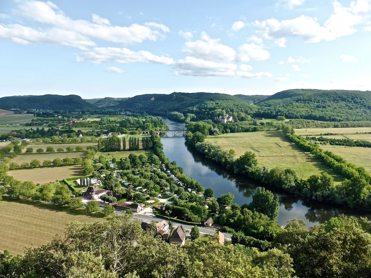 View over the Dordogne River and wooded valley near Domme, France