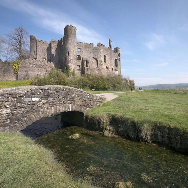 Image of Laugharne Castle, with small bridge over the Taf Estuary