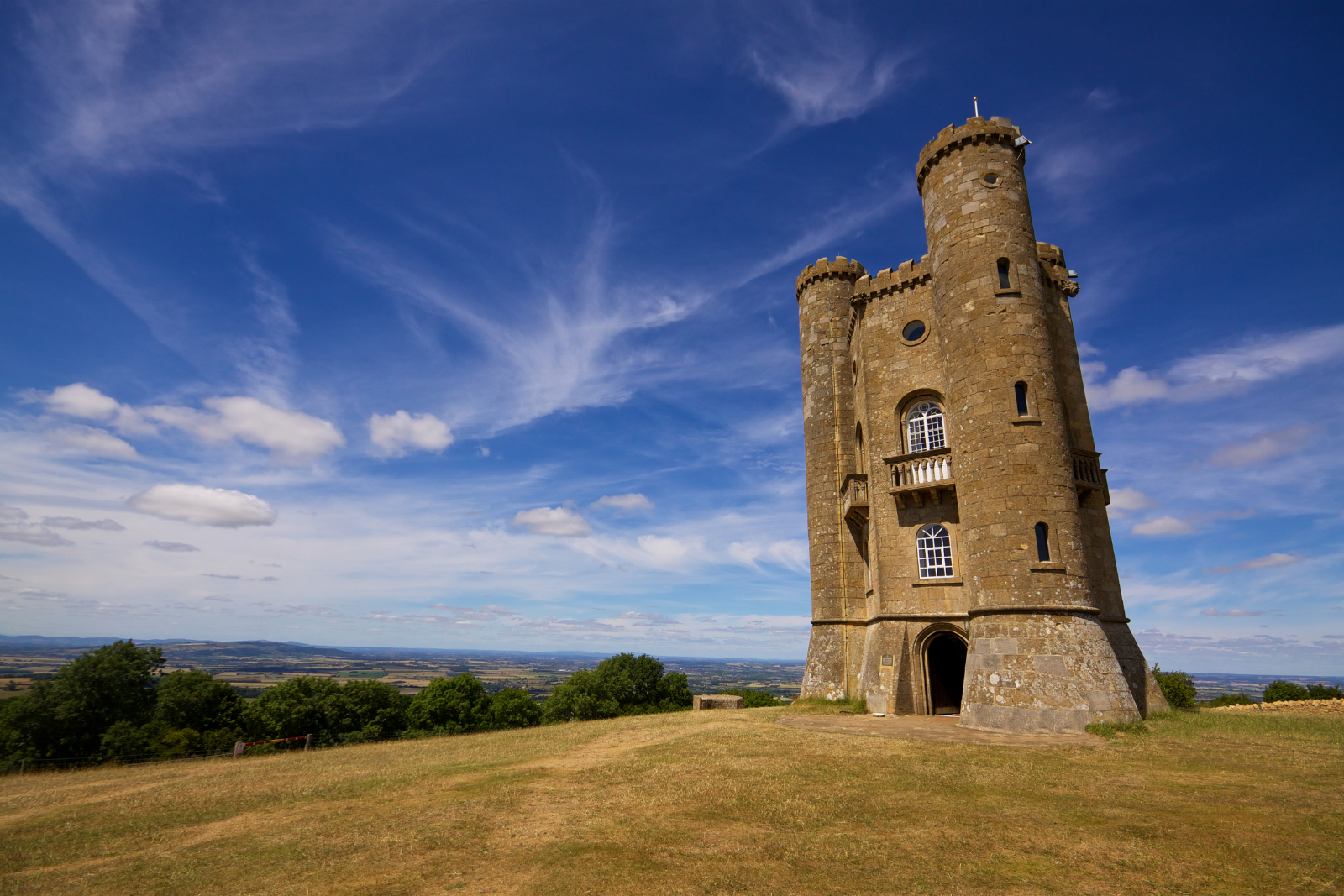 Broadway Tower on the Cotswold Way, with countryside beyond.