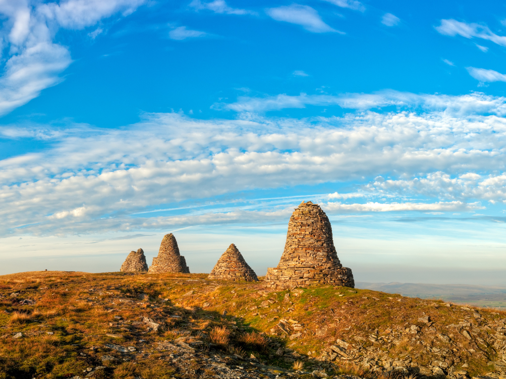 Stone cairns of Nine Standards Rigg on Wainwright’s Coast to Coast.
