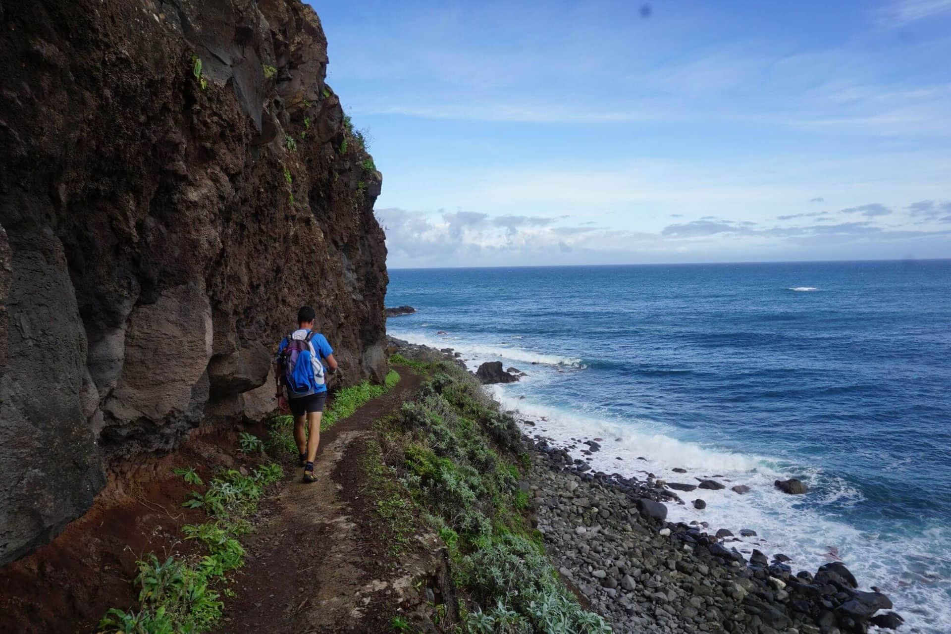 Man walking coat path in Madeira