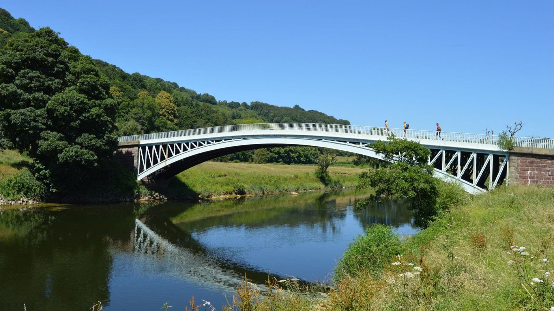 Walkers crossing Bigsweir Bridge