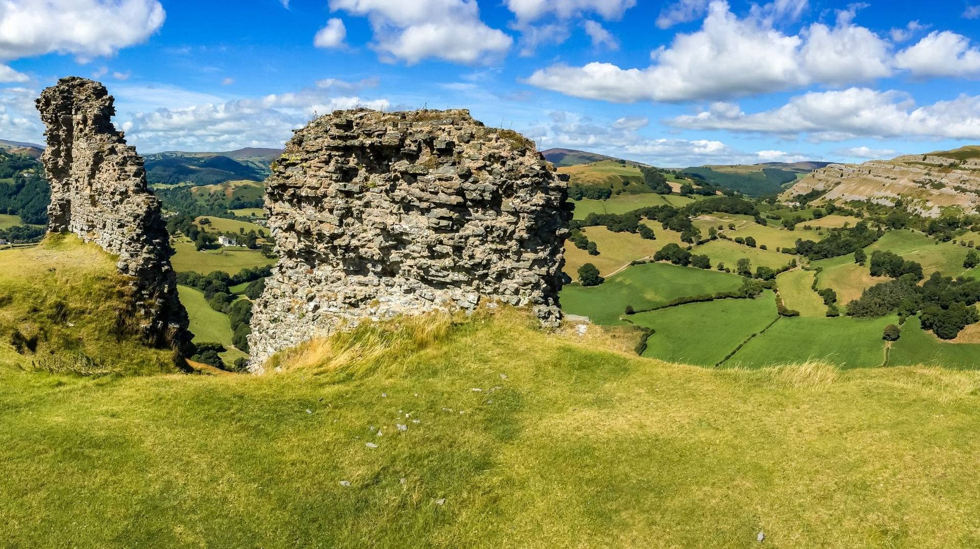 Ruined hilltop fortifications overlooking the Welsh Marches on the Offa’s Dyke Path walking holiday