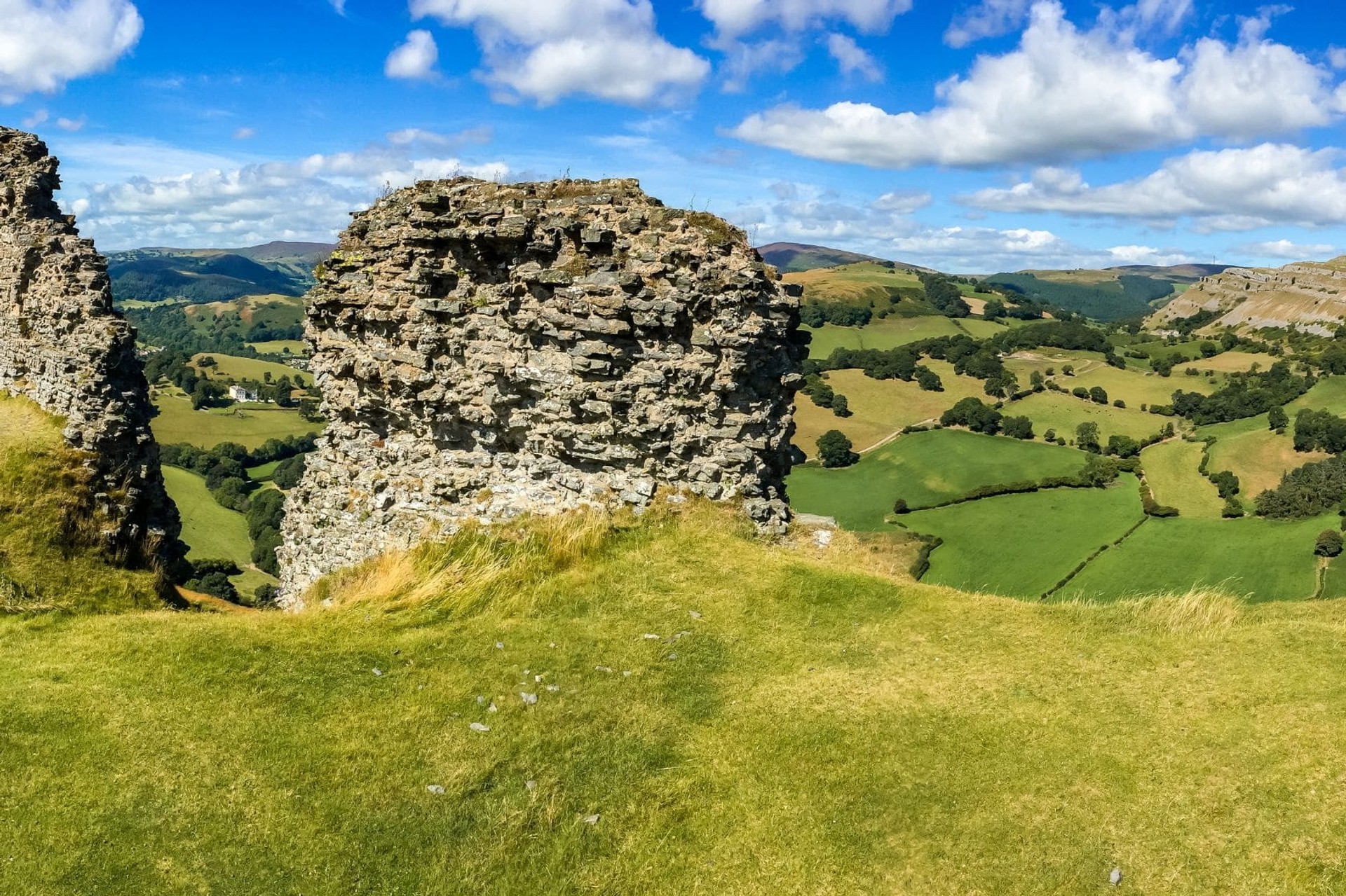 Ruined hilltop fortifications overlooking the Welsh Marches on the Offa’s Dyke Path walking holiday