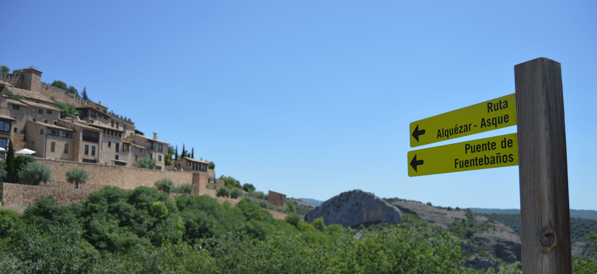 Signpost to Alquézar and Puente de Fuentebaños near Alquézar village, Aragon