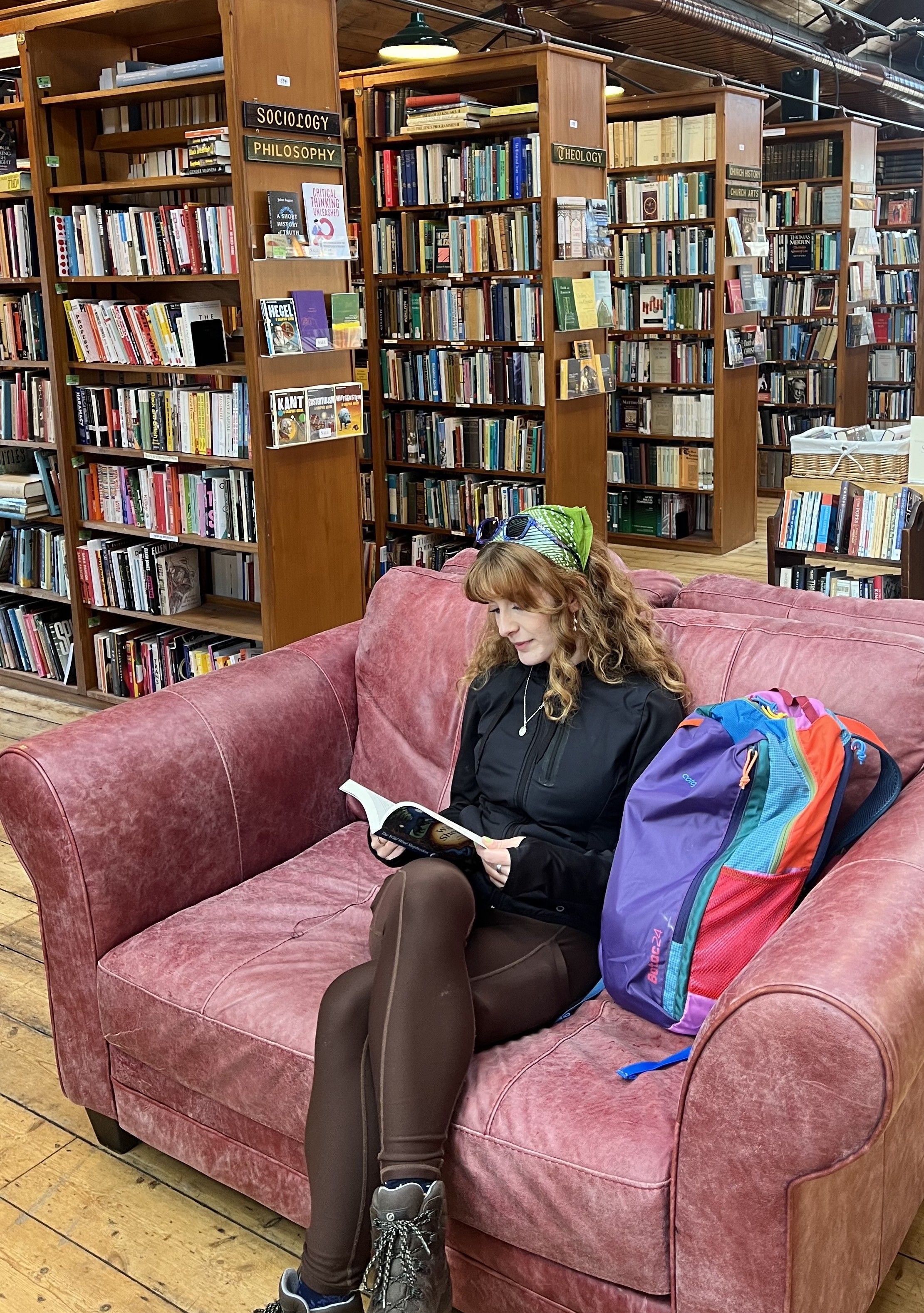 Walker browsing books at Hay-on-Wye's famous outdoor secondhand bookshop
