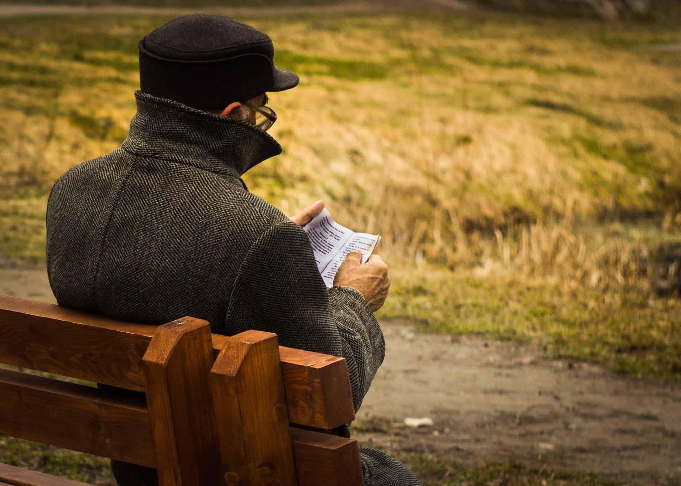 Man Reading Outdoors