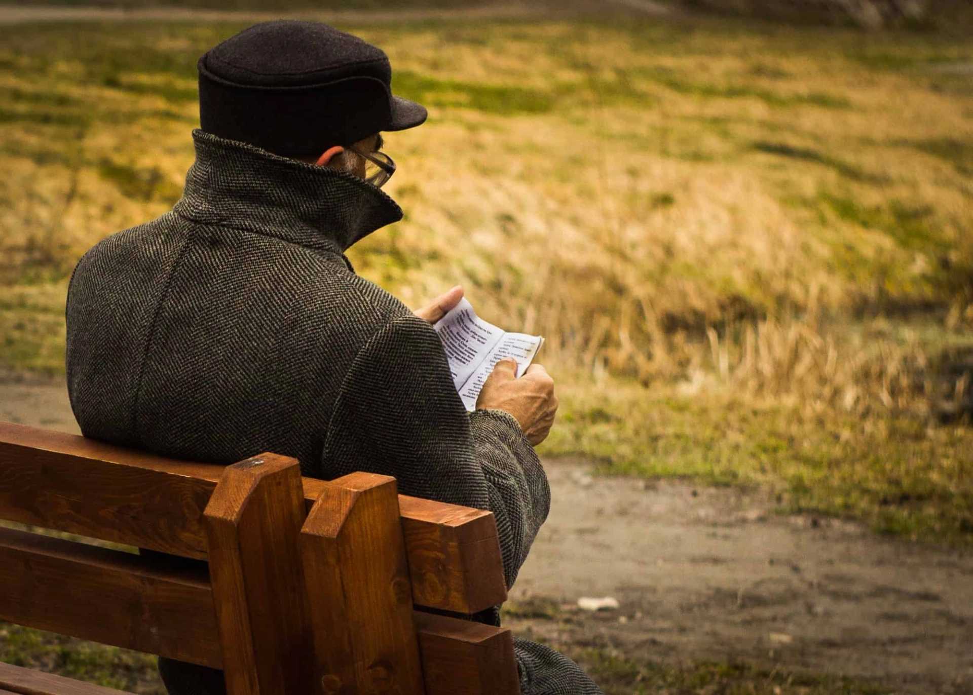 Man Reading Outdoors