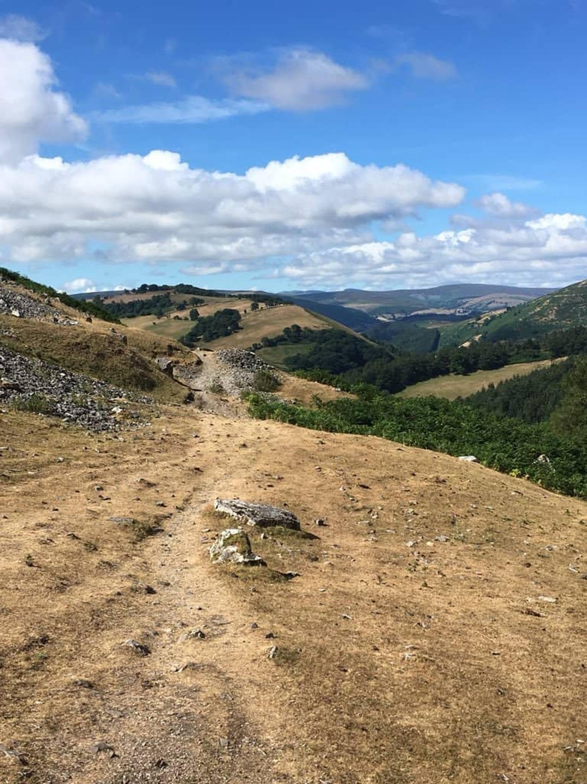 Open hillside trail on the Offa’s Dyke Path with views across the Welsh Marches countryside