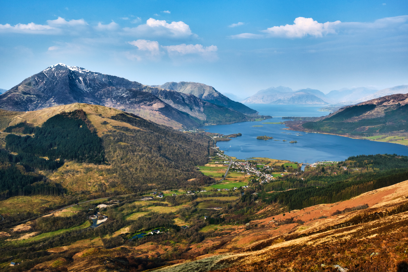 View across Loch Leven and Glencoe, surrounded by Highland mountains.