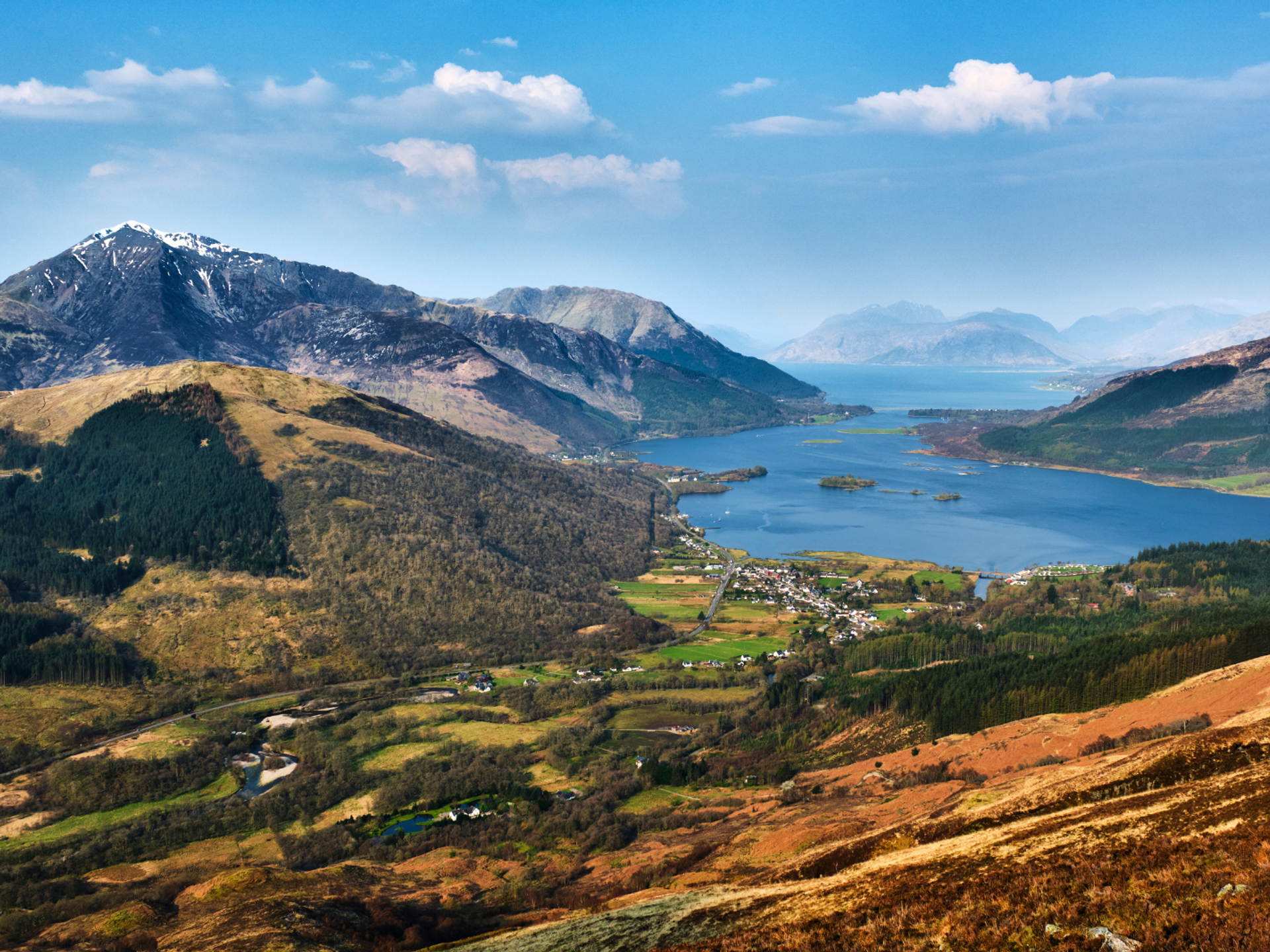 View across Loch Leven and Glencoe, surrounded by Highland mountains.