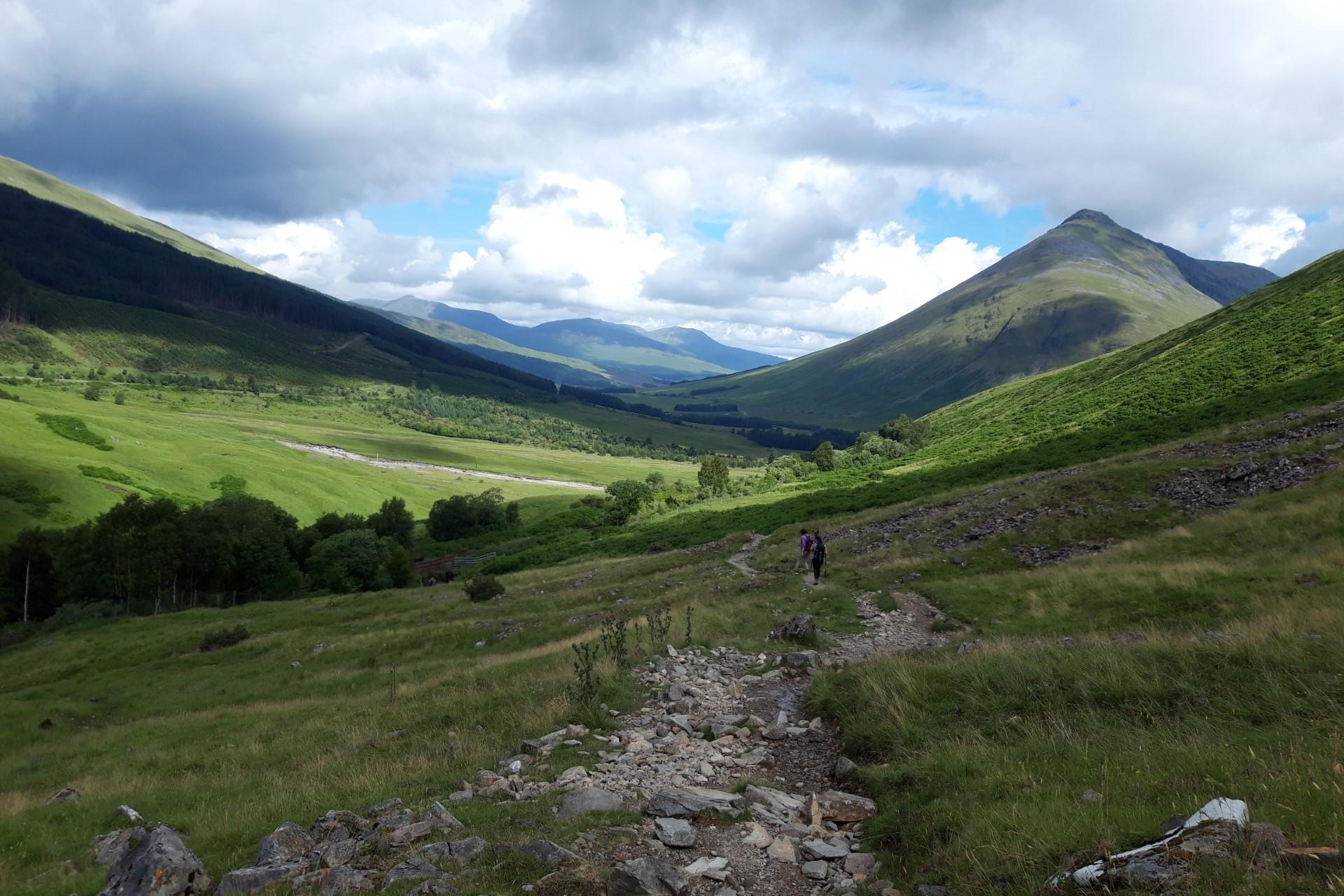 Walkers on the West Highland Way trail in the Scottish Highlands near Glencoe