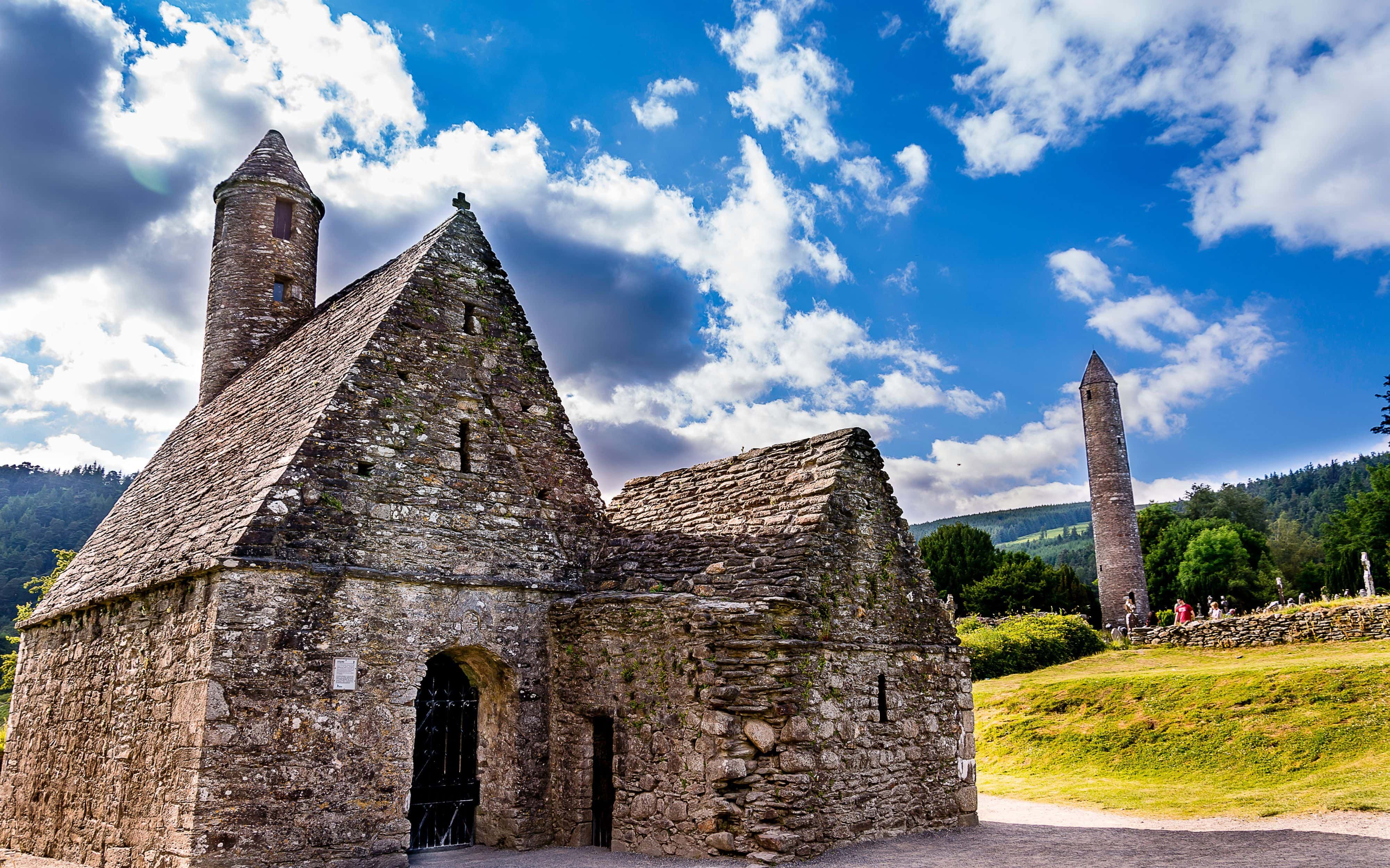 Stone church and round tower at Glendalough monastic site on the Wicklow Way