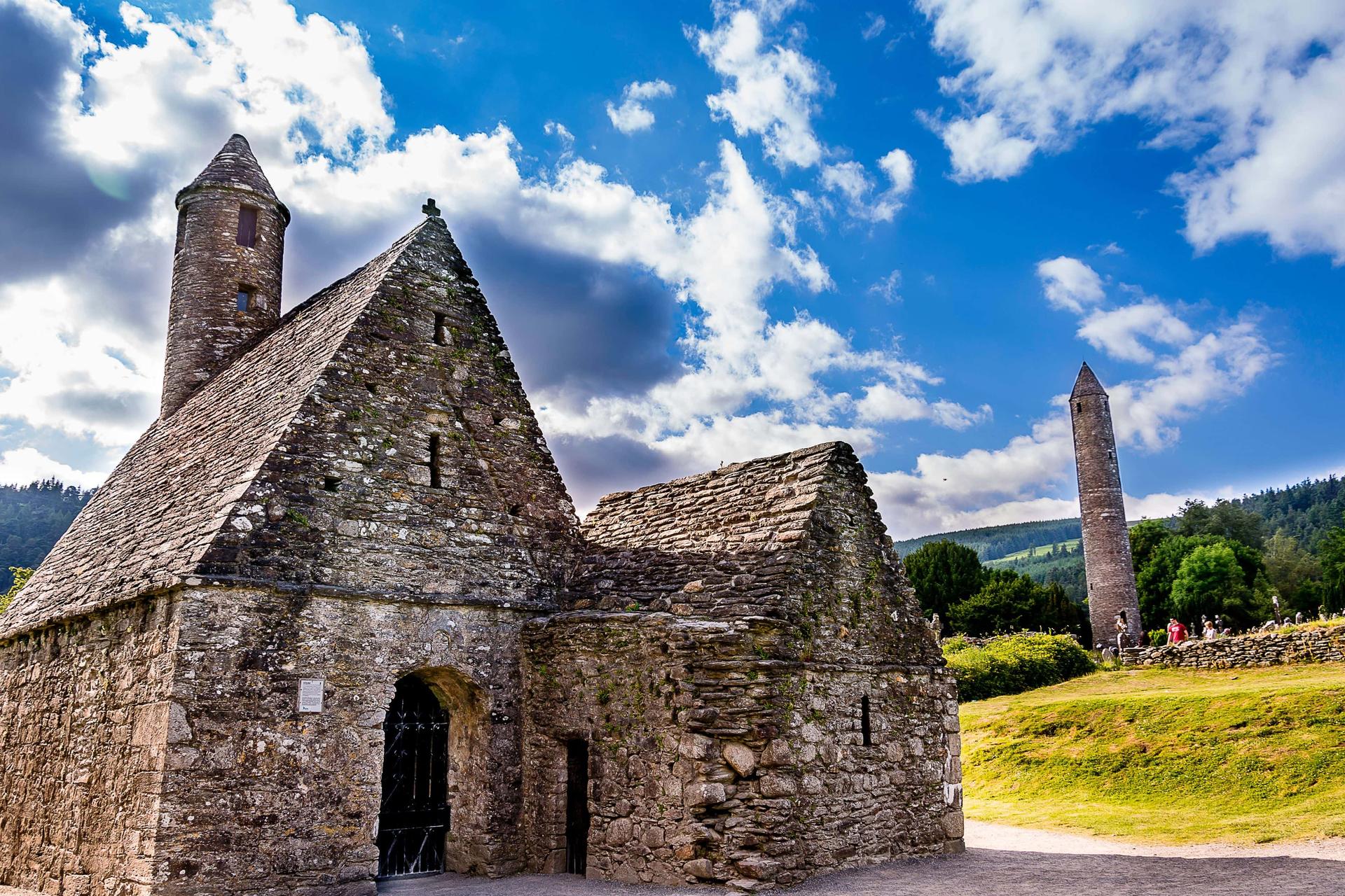 Stone church and round tower at Glendalough monastic site on the Wicklow Way