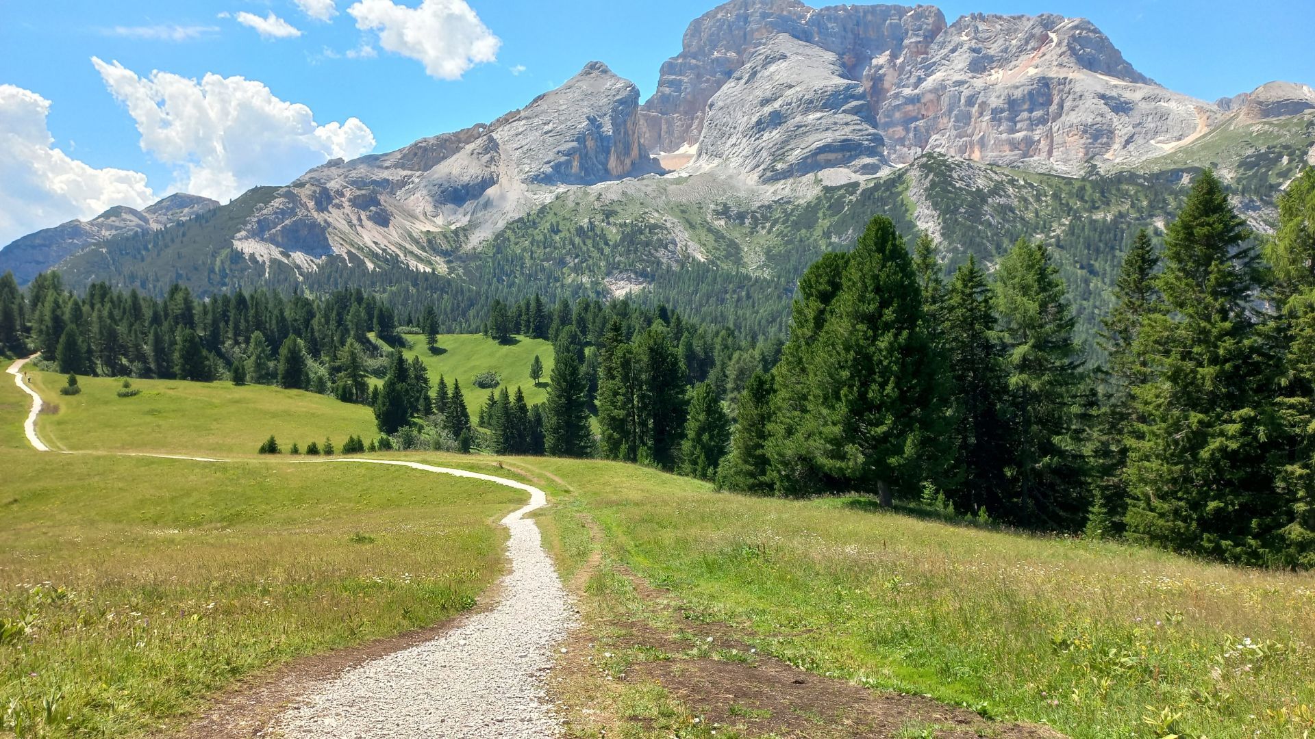 Blue skies over the mountains in Alta Via on a self guided walking holiday