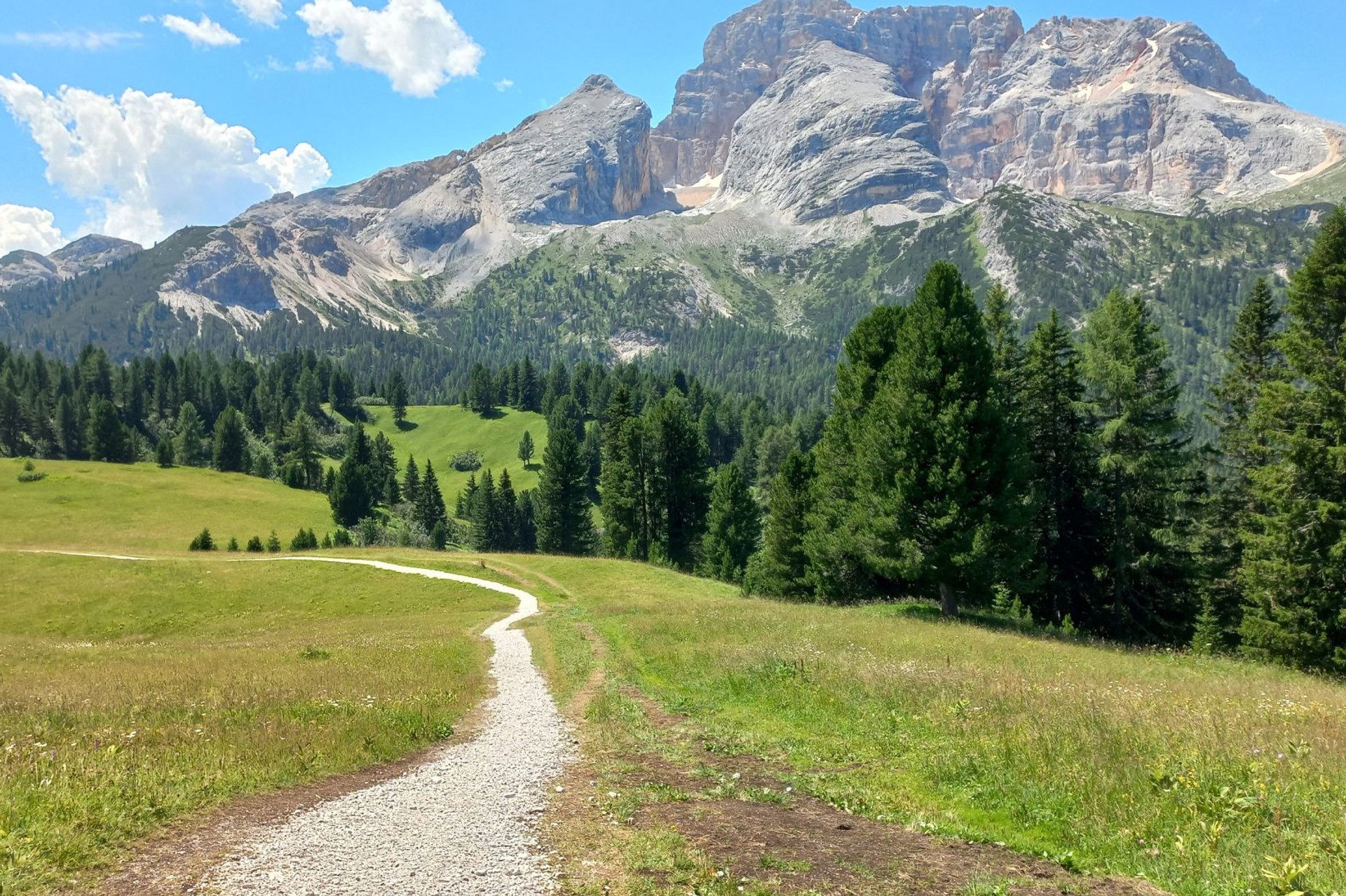 Blue skies over the mountains in Alta Via on a self guided walking holiday