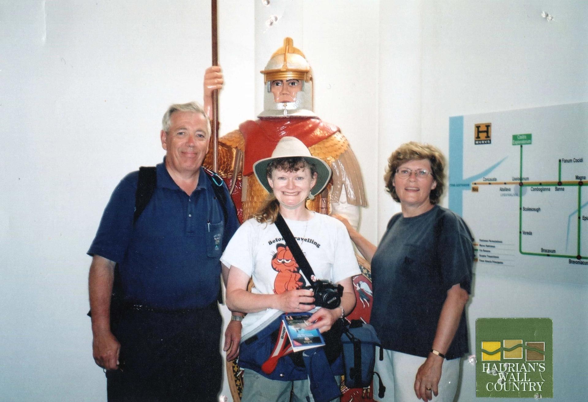 Visitors at Hadrian’s Wall museum with Roman soldier figure