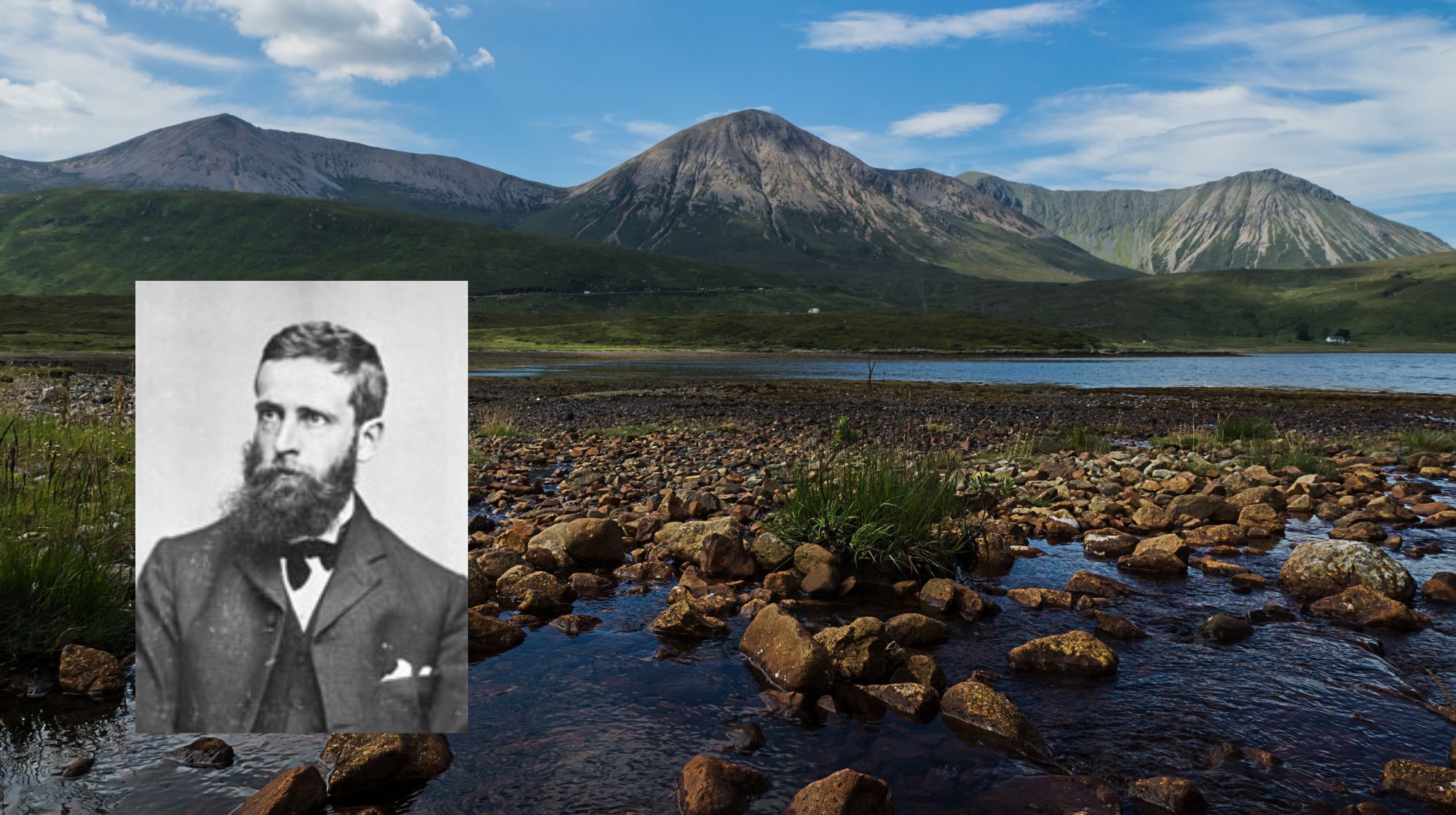 A rocky stream flows towards a calm lake, with rolling green hills and rugged mountains under a partly cloudy blue sky, John Rooke Corbett picture is in the left corner.