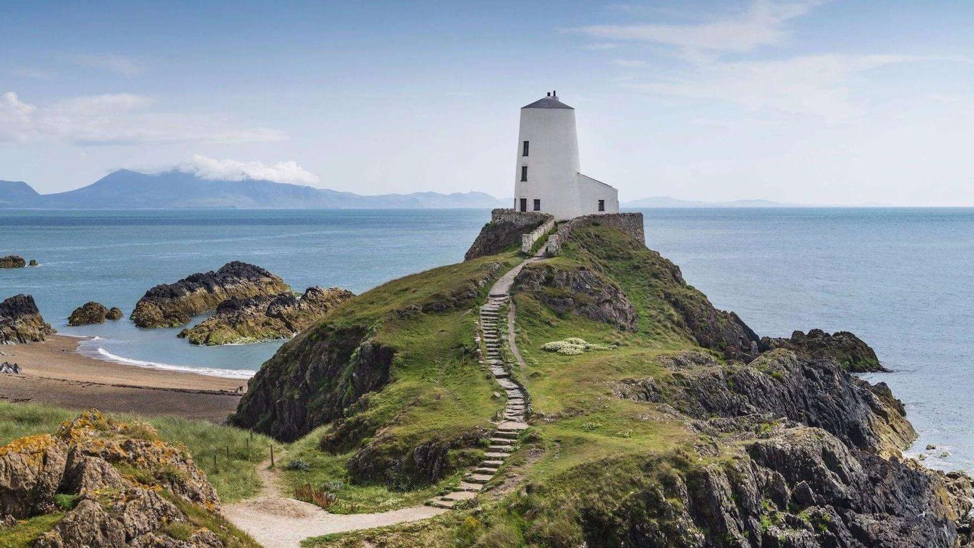 Walking path up to the Tŵr Mawr lighthouse on Llanddwyn Island Anglesey coast path