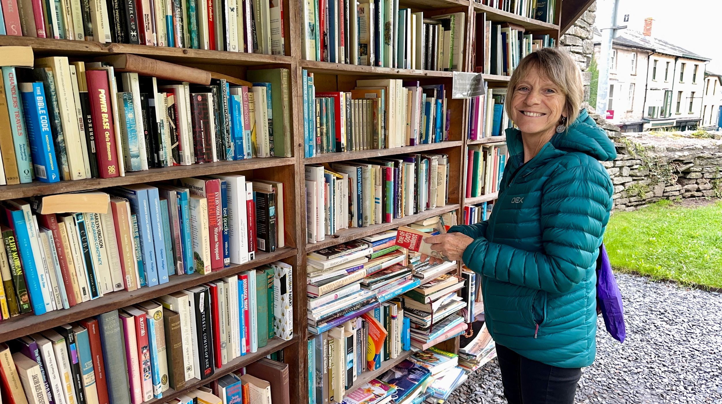 Walker browsing books at Hay-on-Wye's famous outdoor secondhand bookshop