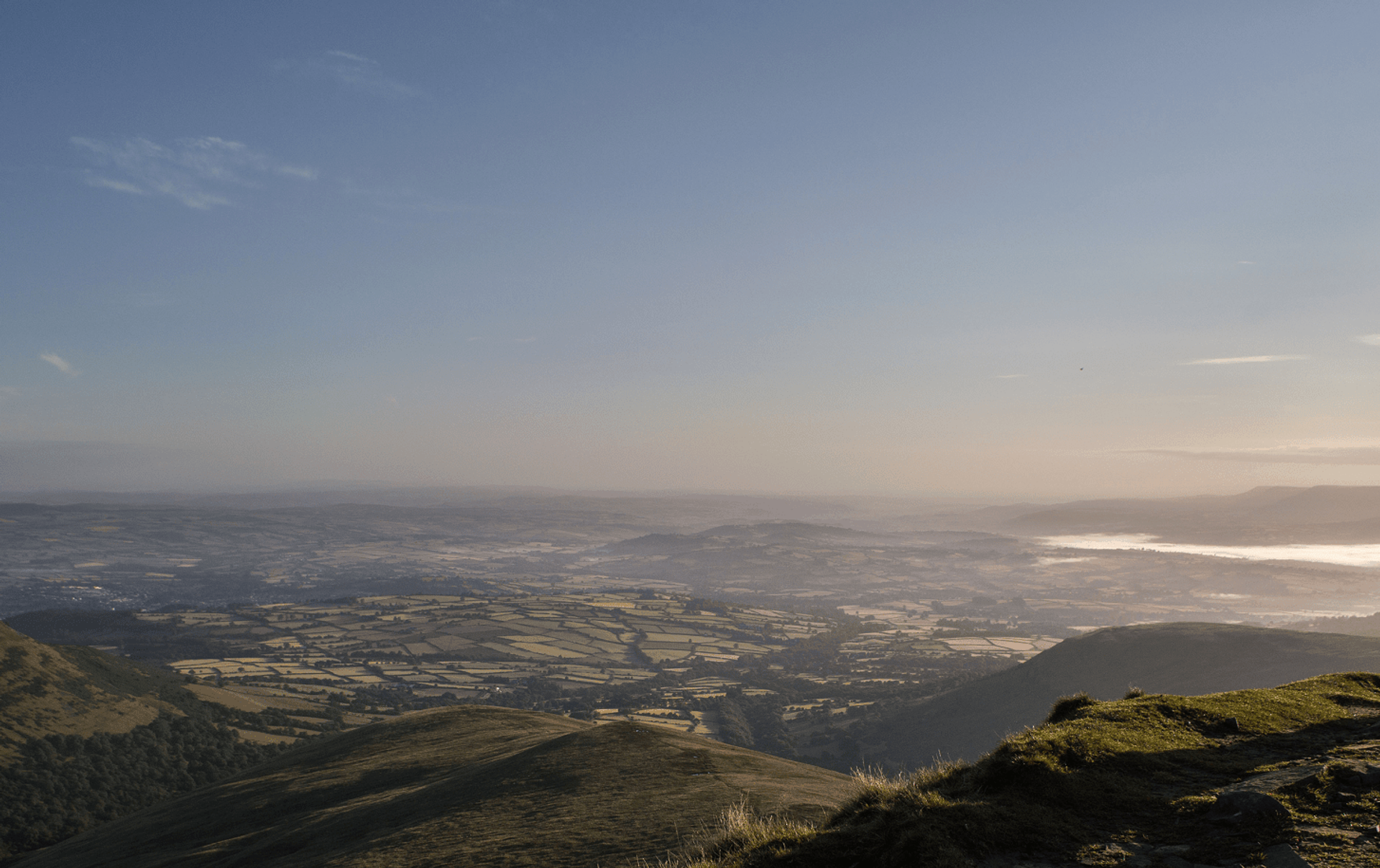 Walker staring out over Brecon Beacons