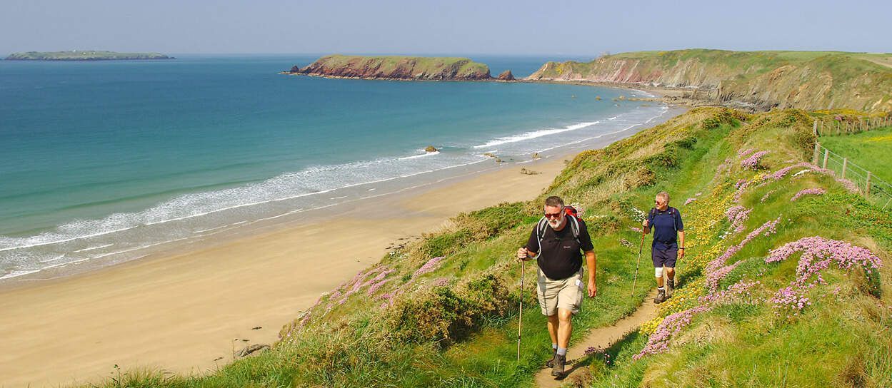Couple walking the Pembrokeshire Coast Path
