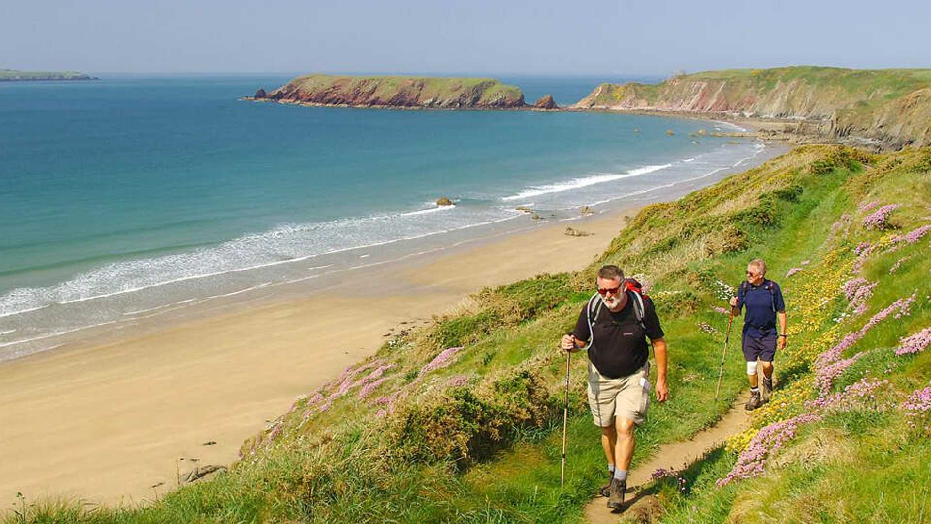 Couple walking the Pembrokeshire Coast Path