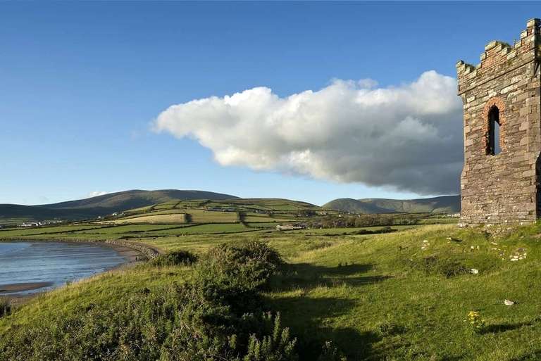 Old stone watch tower overlooking Dingle Bay, County Kerry