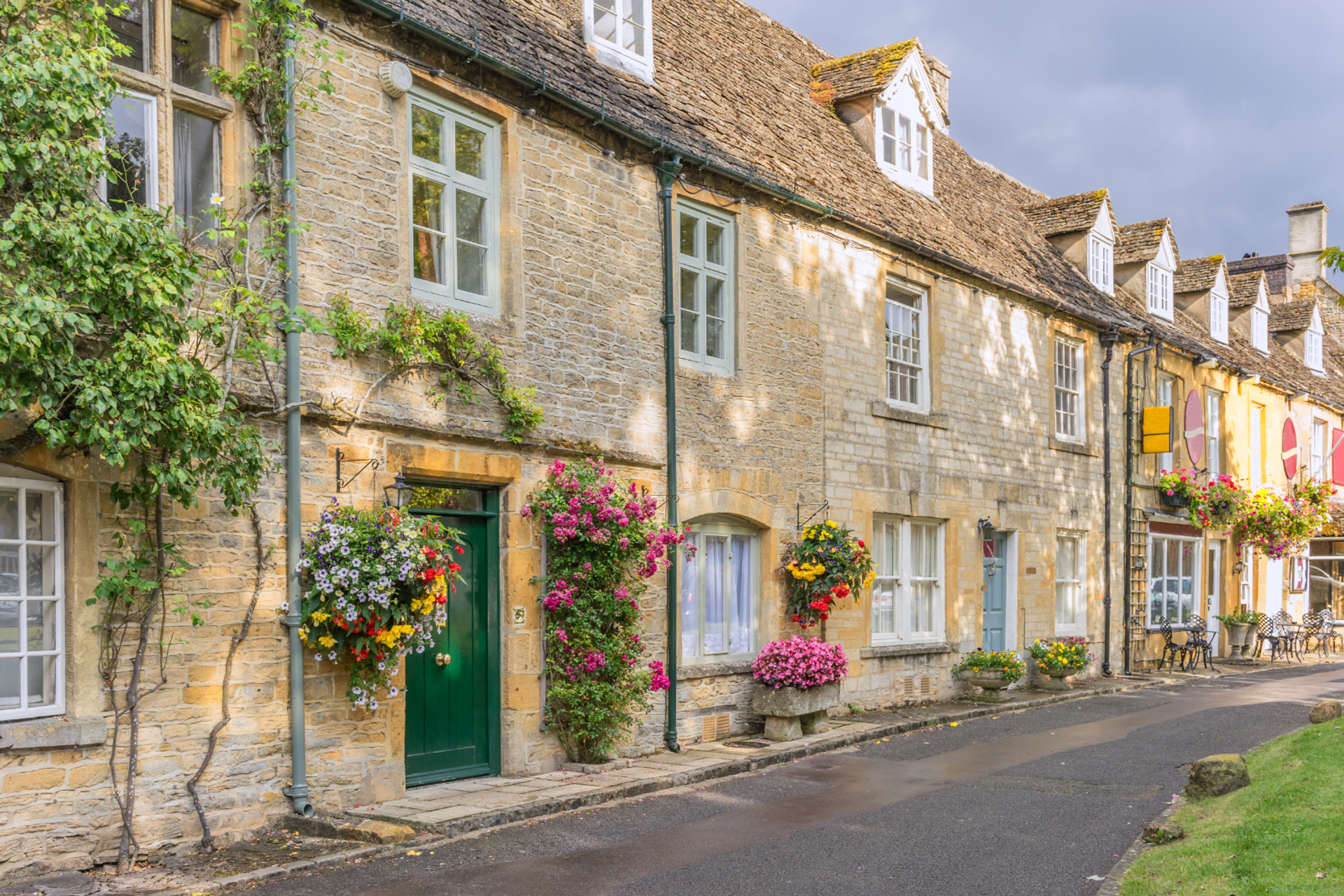Traditional Cotswold stone cottages along a street in Stow-on-the-Wold.